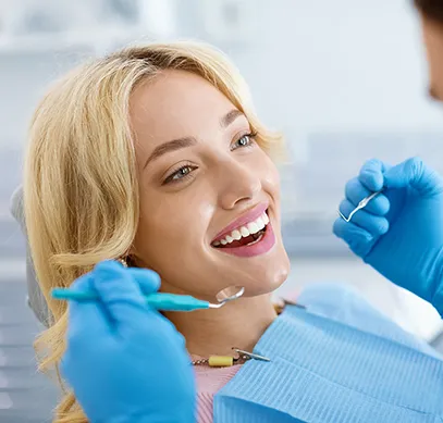 Dental professional with patient